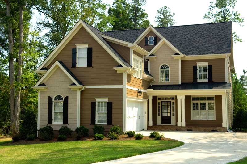 Residential Home Construction Loans Exterior photo of a two story brown home