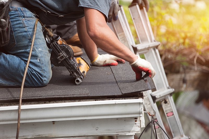 Fix and Flip Rehab Loans from Cetan Funds roofers installing new roof on house